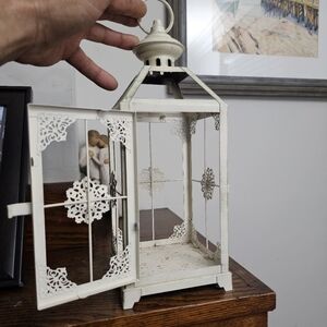 Candle lanterns with glass walls..
